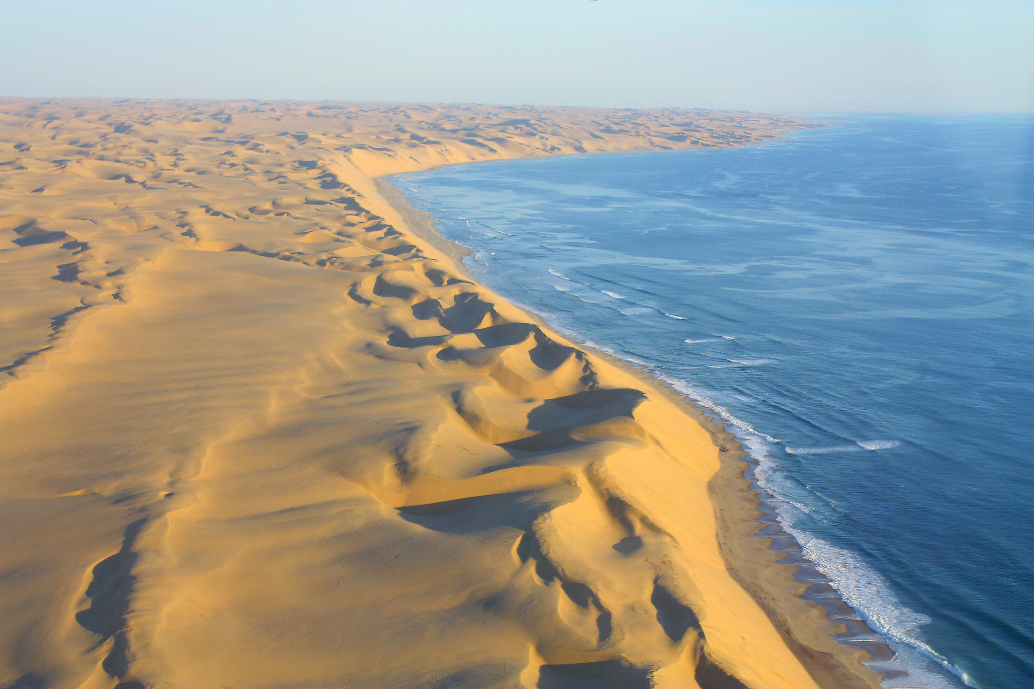 Sanddunes of the Namib Desert meet the Coastline of the Ocean