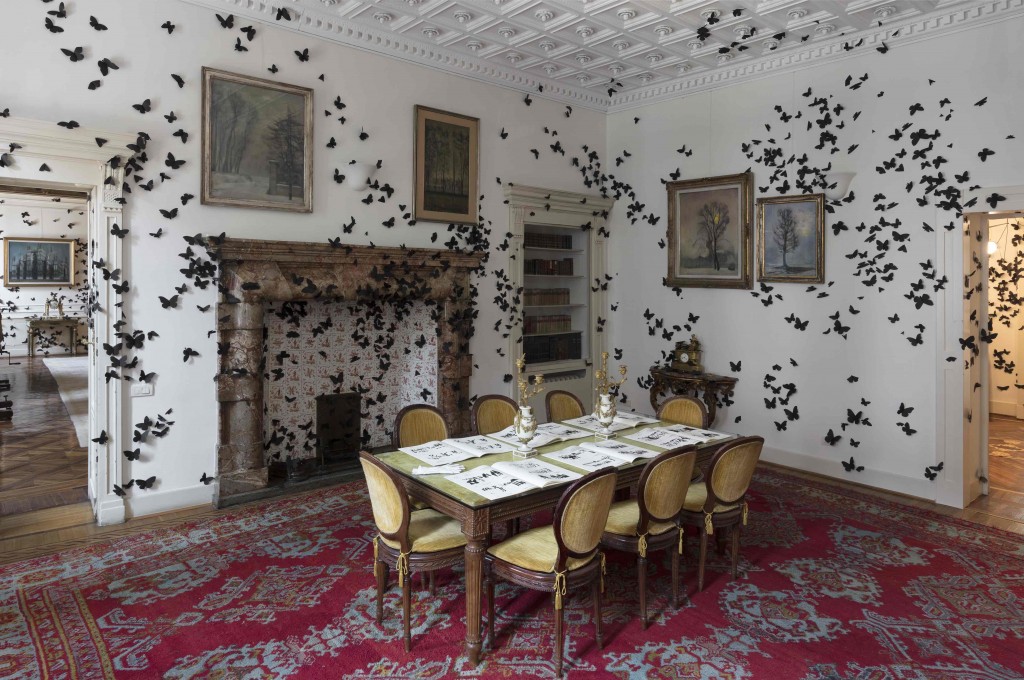 Un interno della Fondazione Pini con l'installazione Black Cloud di Carlo Amorales
