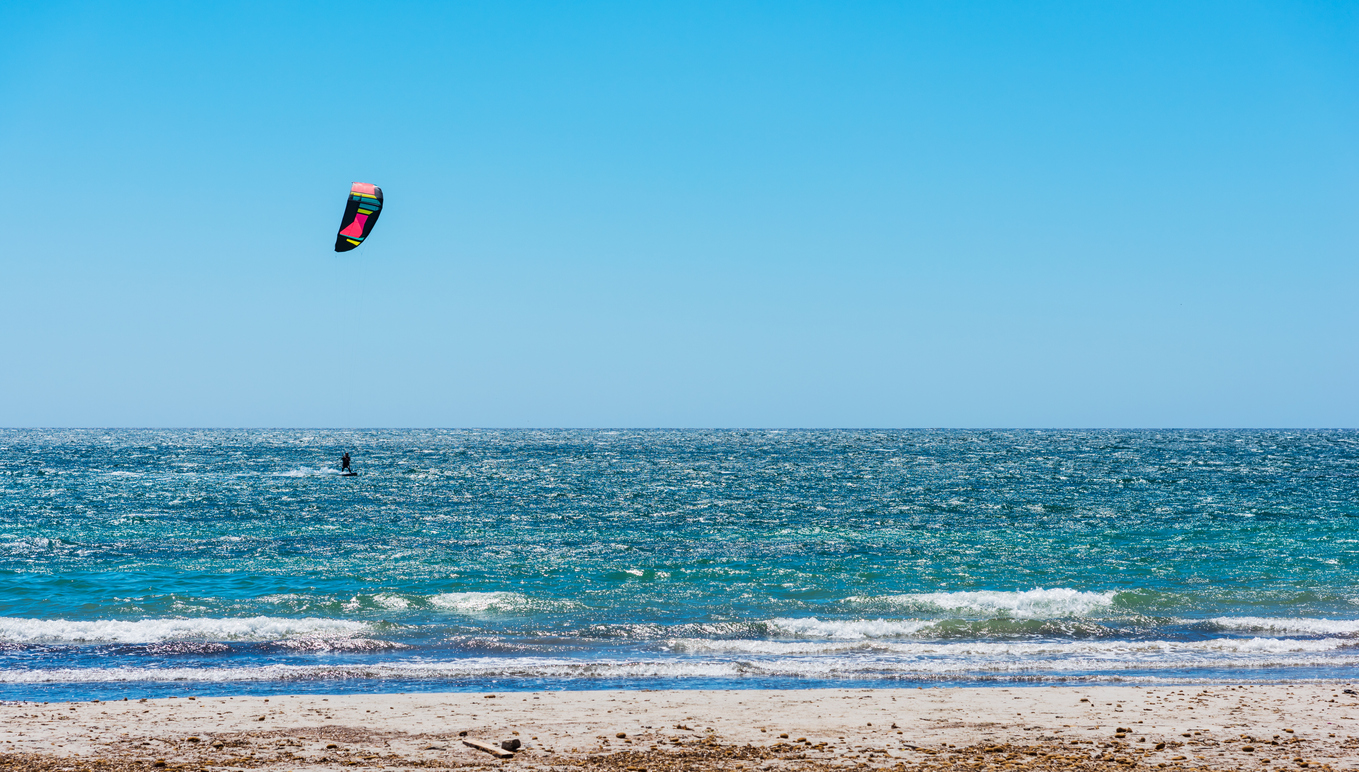 Kite surfing on a clear day in spring