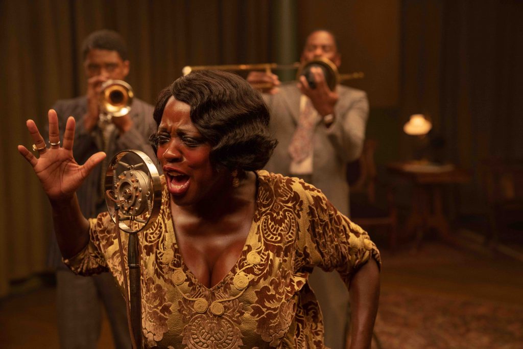 Ma Rainey's Black Bottom (2020): (L to R), Chadwick Boseman as Levee, Viola Davis as Ma Rainey, Colman Domingo as Cutler. Cr. David Lee / Netflix